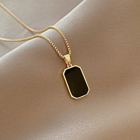 Black chip double sided pendant